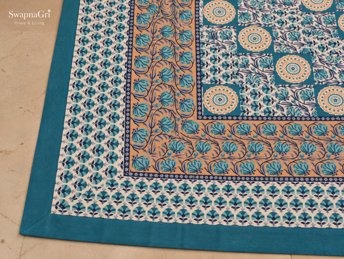 Close-up of SwapnaGri Teal Blue Patchwork Floral cotton bedsheet decorative border