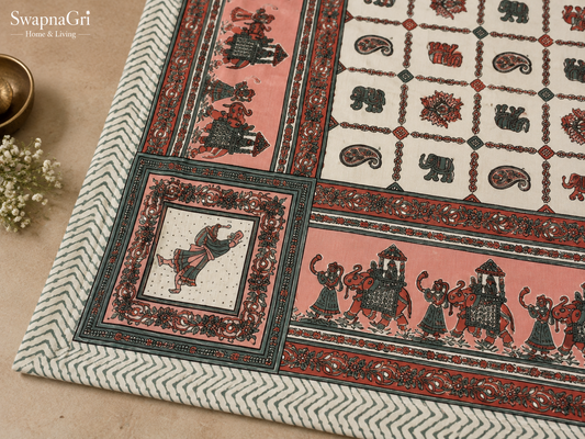 Close-up of green floral printed cotton bedsheet border and traditional motifs