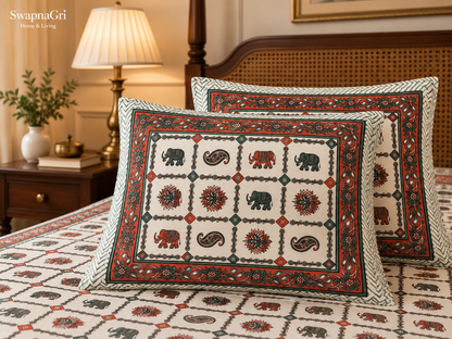 Matching green floral printed pillow covers with traditional motifs