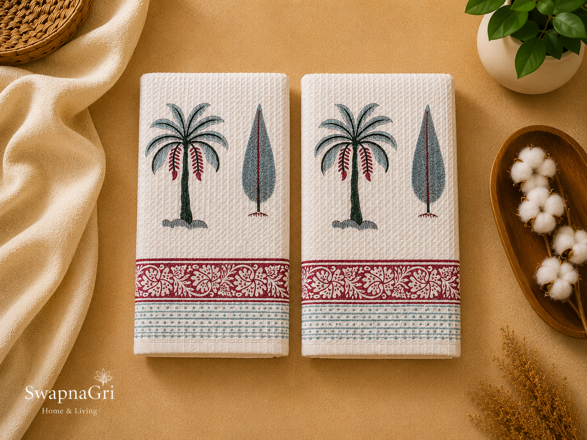 Palm Breeze pair of hand towels with palm tree and leaf motifs