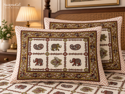 Cotton fabric close-up showing elephant, floral and paisley pattern