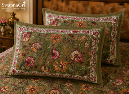 Close-up of SwapnaGri olive green floral printed pillow covers and bedsheet