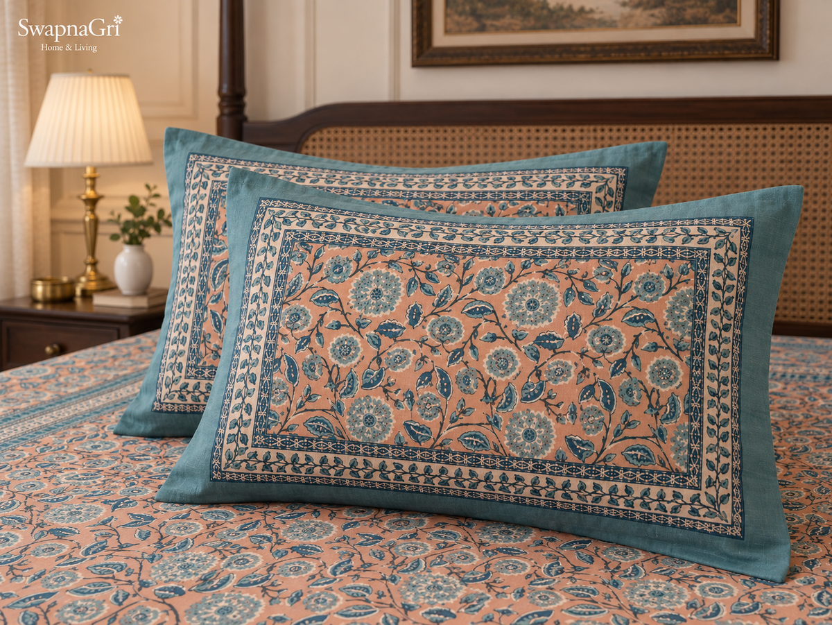 Close-up of SwapnaGri Peach & Teal Floral cotton bedsheet decorative border and print