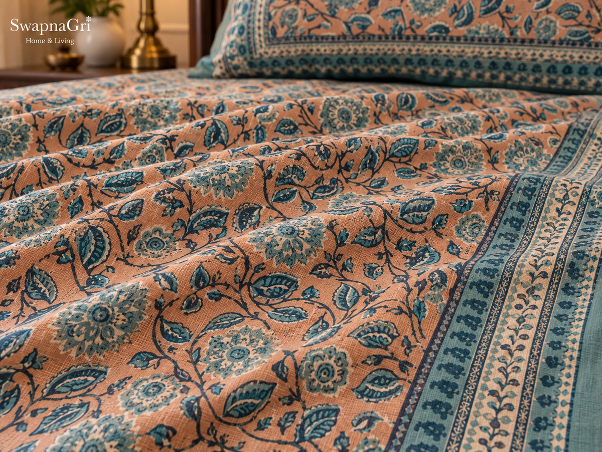 Close-up of SwapnaGri Peach & Teal Floral cotton bedsheet print and fabric texture