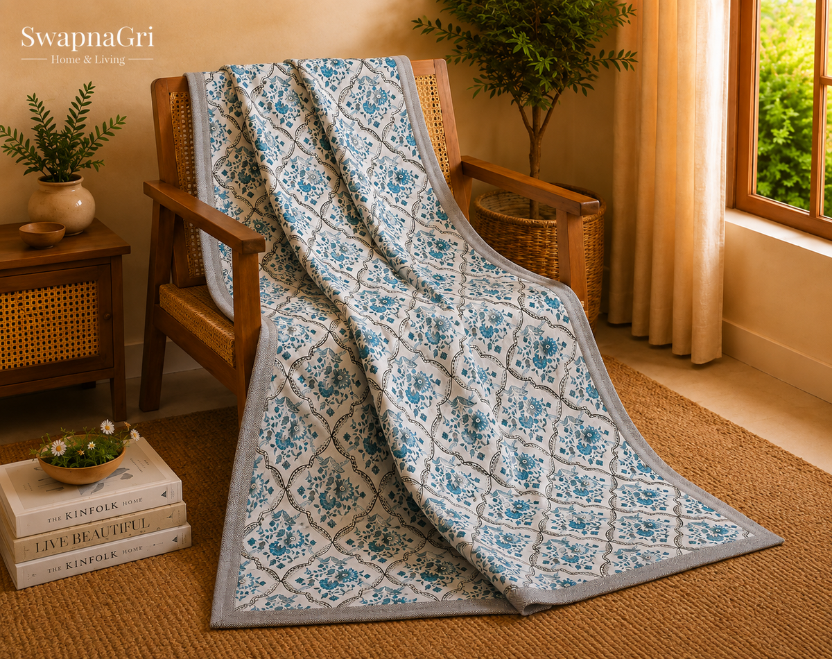 Tea Blue Floral Cotton Double Dohar styled on a bed with layered presentation